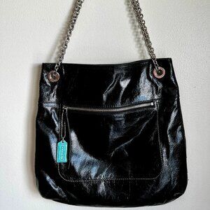 Coach Poppy Slim Black Leather Tote, with silver chain strap.